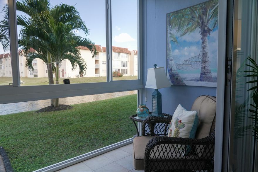 Welcome to this beautifully updated 1-bedroom, 1-bath condominium offering comfort, convenience, and serene lakefront living. This move-in ready unit features a recently renovated kitchen with elegant granite countertops and stainless steel appliances, complemented by fresh paint throughout. Enjoy peace of mind with all impact windows and doors, a brand new A/C installed in October 2025 and roof is 2 yrs old. Tile flooring throughout and a bright, open layout with a picturesque lake view. Maintenance covers cable, internet, water, trash, and even an appliance warranty, providing exceptional value and ease of living. Located in a well maintained 55+ community, amenities include clubhouse, multiple pools, fitness center, tennis and shuffleboard