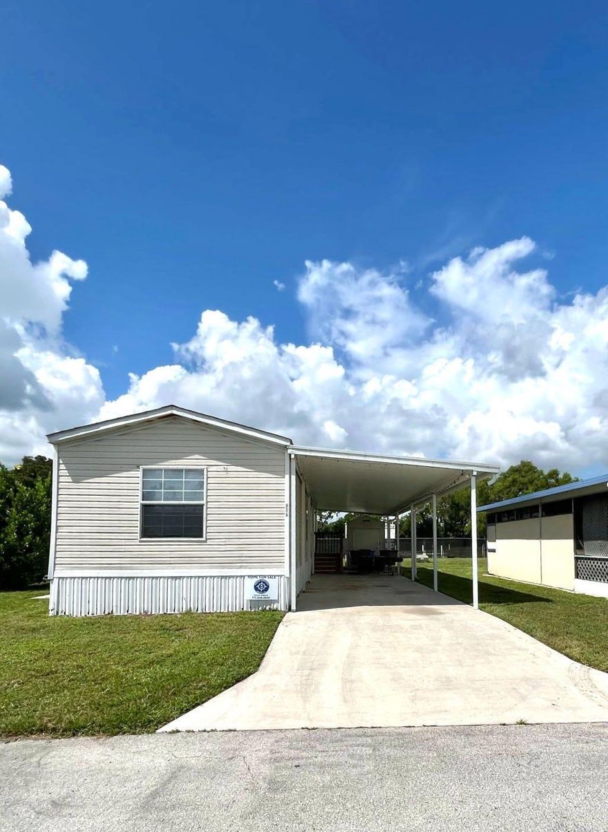 Discover easy living in this well-kept 2-bedroom, 2-bathroom home, featuring a spacious layout that offers comfort, functionality, and room to make it your own. Whether you're starting out, looking for a winter retreat, or ready to downsize, this home is a solid choice. Located in the heart of Stuart this is an ALL-AGE mobile home park that ALLOWS PETS. The park also offers a community pool and clubhouse, giving you a simple place to relax or connect with others. No HOA only pay land lease which will be a little over $900 a month. Land Lease fee covers lawn care maintenance, water, trash, sewer, and use of the park's shared amenities and property taxes.  Call for more details and a tour!