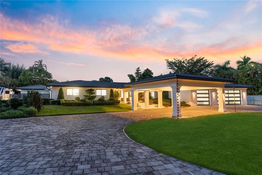 ***THIS TURNKEY EQUESTRAIN OPERATION ON 2.35 ACRES IS A HORSE LOVER'S PARADISE!!!*** EXCEPT FOR THE SHELL, EVERY COMPONENT OF THE HOUSE IS NEW! FINALIZED W/4 BEDROOMS,3.5 BATHS, NEW 3 CAR GARAGE & PORTE COCHERE. NEW MODERN INTERIOR TASTEFULLY DONE W/DESIGNER KITCHEN AND NAME BRANDS APPLS. NEW POOL/SPA W/PAVERS, COMPLETED W/NEW PERGOLA/SUM KIT. NEW ROOF & ALL IMPACT GLASS. 3 BARNS-TOTAL OF 10 STALLS & A STATE OF THE ART ARENA (142'X200') W/SUPERIOR FOOTING,EXCELLENT DRAINAGE,IRRIGATION & FLY SPRAY SYSTEM. FULL TACK & SEPARATE FEED RMS W/EXTRA STORAGE. FORTIFIED W/FENCING AND COLUMNS, CIRCULAR D/W W/DOUBLE GATED ENTRY. MATURE LANDSCAPING & TROPICAL FOLIAGE HIGHLIGHTS THIS CHARMING COUNTRY STYLE RANCH HOME. FULL BACK-UP GENERATOR. COMPLETED W/RELAXING POND, WATERFALL, FRUIT TREES & MUCH MORE.