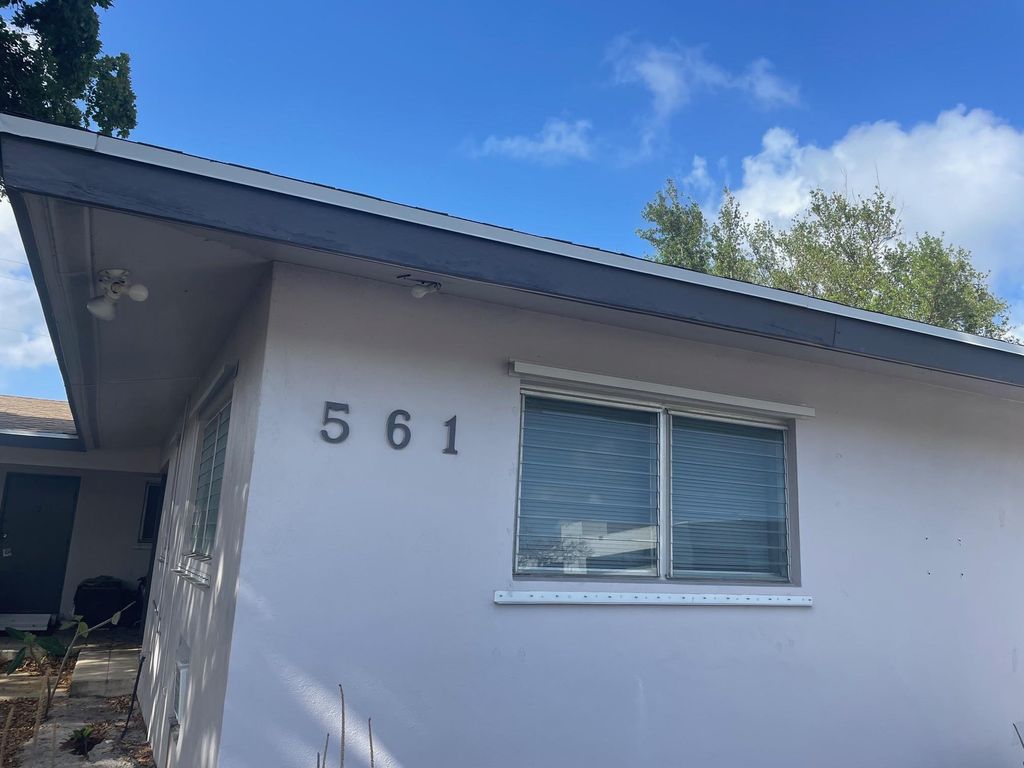 Photo of 561 NE 45th Street, Boca Raton, FL 33431 (MLS # F10498372)
