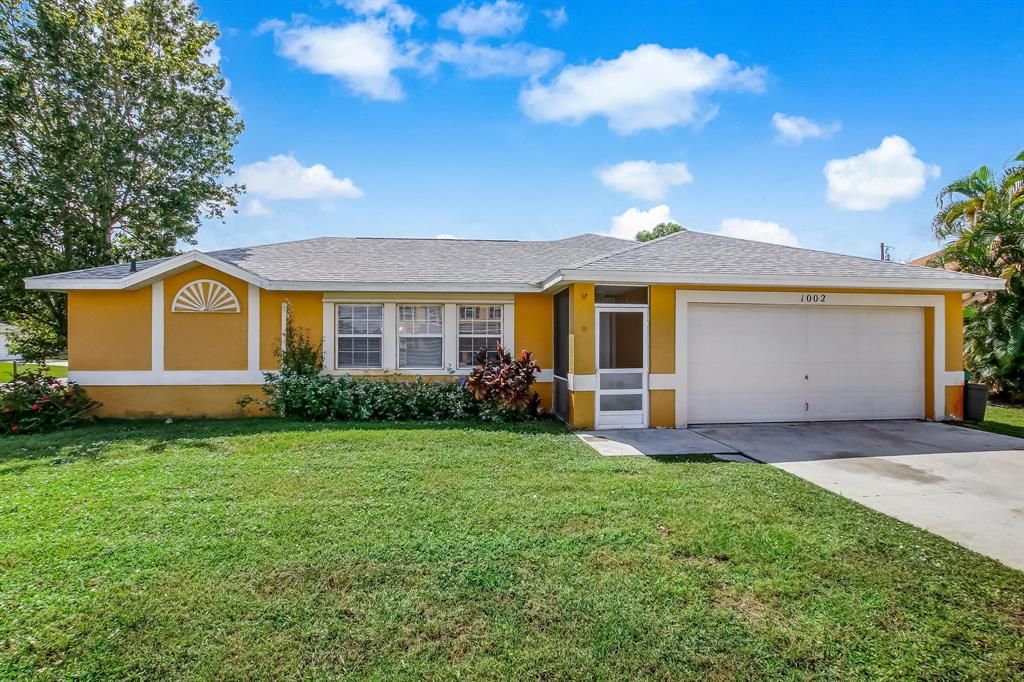 Photo of 1002 SW Charcoal Avenue, Port Saint Lucie, FL 34953 (MLS # R10728682)