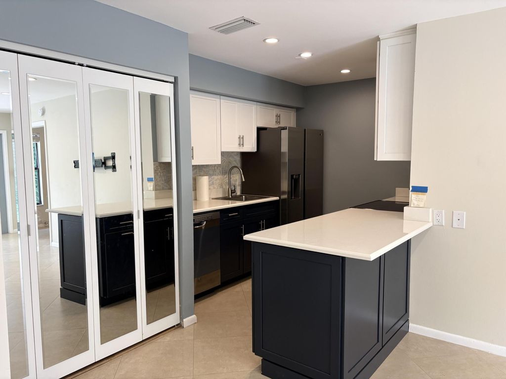 Photo of 600 Executive Center Drive #212, West Palm Beach, FL 33401 (MLS # B26020192)