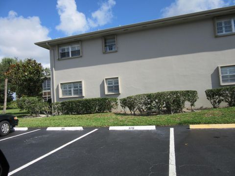 Photo of 1 Lake Vista Trail #201, Port Saint Lucie, FL 34952 (MLS # B26010611)
