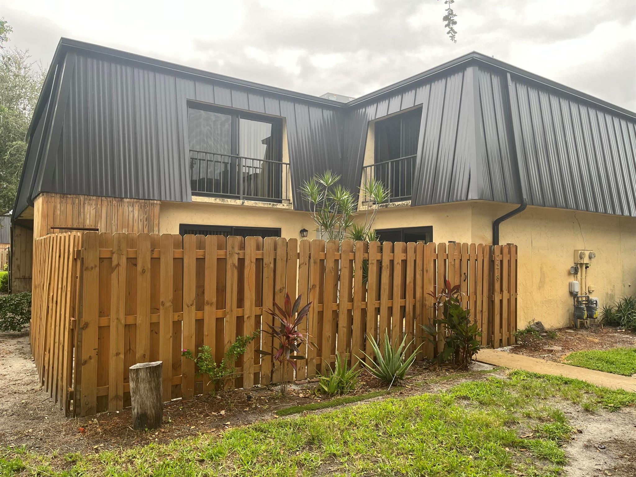 Great 2/2.5 Townhome with Impact Windows! Newly fenced private patio! Great floorplan.