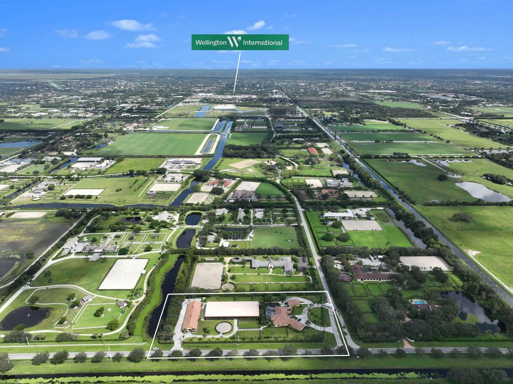 Photo of 4985 Stables Way, Wellington, FL 33414 (MLS # B26013117)