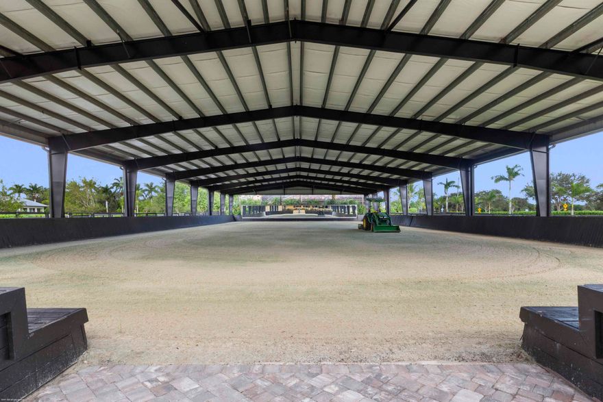 Top-Tier, Fully Renovated Equestrian Facility - Stalls are now being offered for the equestrian season at this ultra-luxury sport horse estate. PRICE REFLECTS THE SEASONAL STALL RATE. Located across the street from the bridle path and  hackable to the south entrance of the show grounds, this 5-acre equestrian property offers a recently constructed 85' x 200' sub-irrigated COVERED ARENA (by Wordley Martin) equipped with mirrors, kick-boards and multiple viewing areas. The fully remastered 12-stall center aisle barn boasts a well appointed riders lounge with a full bathroom, partial kitchen and elevated inside-outside views of the riding arena. Designed with attention to detail, the barn is outfitted with all the bells & whistles, including a brand-new European stall system.  The stately barn also features tongue-and-groove ceilings, elegant chandeliers, large center aisle fans and a new paver aisle way. The barn has 2 interior grooming/wash stations, 2 exterior wash racks, 2 a/c'd storage rooms (with direct exterior access), 2 tack rooms with individual laundry facilities, and a large well equipped feed room. Each stall is equipped with a fly-spray system, individual fans, water and lighting. All the wash stalls include hot & cool water. There is a studio grooms office with a full bathroom, bed, kitchenette and laundry facility. The barn is complete with functional window shutters for the stalls and roll down doors for the center aisle openings.  Additional property features include a raised viewing area, a round pen, six paddocks, 1 RV hookup and separate automatic gated entry with ample parking & trailer parking for the stable.  Up to 12 stalls available.  $13,000 price is the seasonal rate per stall for a 4 month stay, $14,500 for a 5 month stay, $16,000 for a 6 month stay. Studio Office in the barn is also available, offered at the same rates.   There is an 8 stall minimum.  RV hookup available for $1,000/Month