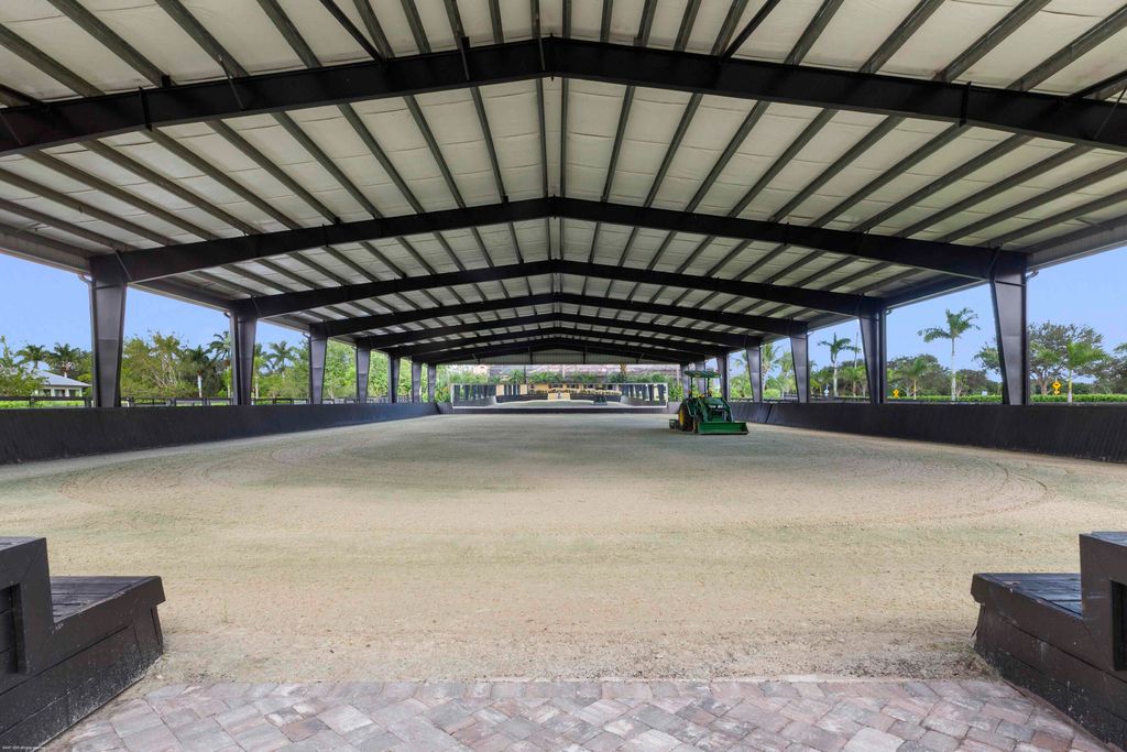 Photo of 4985 Stables Way, Wellington, FL 33414 (MLS # B26013117)