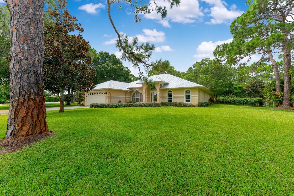 Photo of 3168 SW Bessey Creek Trail, Palm City, FL 34990 (MLS # R10912620)