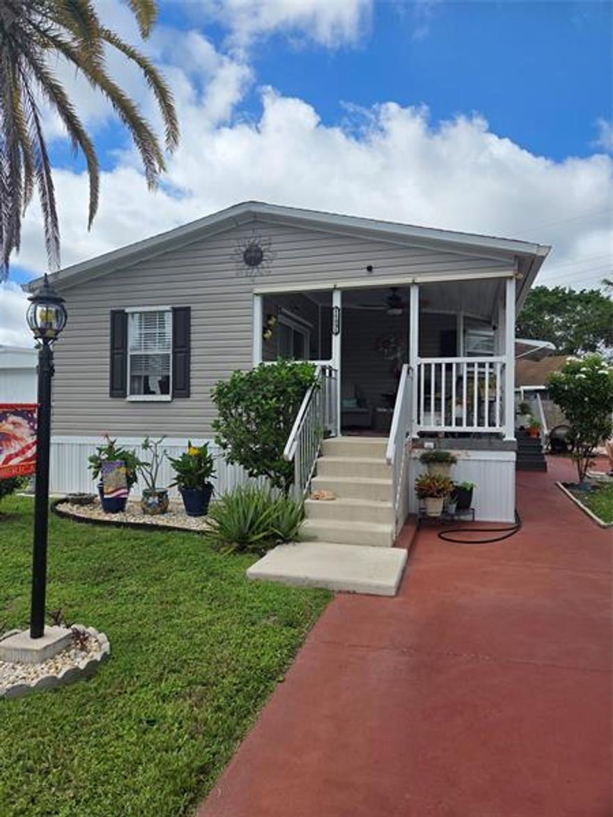 NO LAND LEASE. YOU OWN THE LAND! THIS LIGHT AND LOVELY MANUFACTURED HOME IS THE PERFECT MOVE IN READY GET-AWAY OR FULL TIME HOME IN DELRAY BEACH. THE HOME HAS A GREAT OPEN FLOOR PLAN FEATURING A LARGE LIVING ROOM AND DINING ROOM. YOU'LL LOVE THE UPDATED KITCHEN WITH STAINLESS STEEL APPLIANCES,CENTER ISLAND WITH GRANITE COUNTERTOPS THROUGHOUT., THE PRIMARY BEDROOM HAS AN ENSUITE BATH WITH SHOWER AND DOUBLE CLOSETS.  SPEND COUNTLESS HOURS ON YOUR COVERED PORCH FEATURING TREX DECKING FOR LOW MAINTANANCE. THERE'S ALSO A SIDE YARD AND A SHED FOR PLENTY OF STORAGE. DRIVEWAY PARKING FOR CONVENIENCE AND ALSO PARKING FOR YOUR RV OR BOAT IN THE COMMUNITY FOR A FEE. BEING LESS THAN 10 MINUTES FROM THE BEAUTIFUL DELRAY DOWNTOWN AND AWARD-WINNING BEACH MAKES THIS THE PERFECT CHOICE! 55+ COMMUNITY.