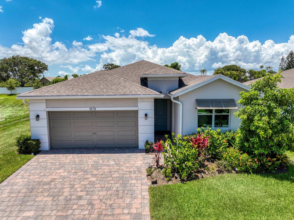 Photo of 1878 NE Ocean Dunes Drive, Jensen Beach, FL 34957 (MLS # R11100783)