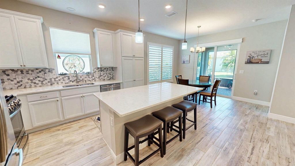 Photo of 9525 SW Royal Poinciana Drive, Port Saint Lucie, FL 34987 (MLS # R11072652)