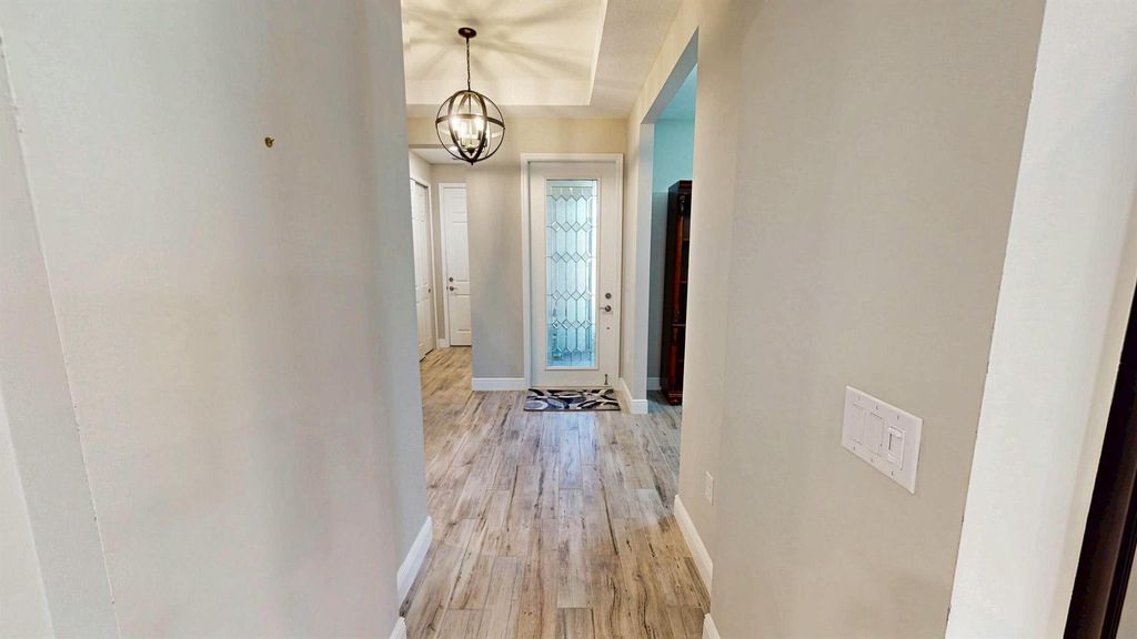 Photo of 9525 SW Royal Poinciana Drive, Port Saint Lucie, FL 34987 (MLS # R11072652)