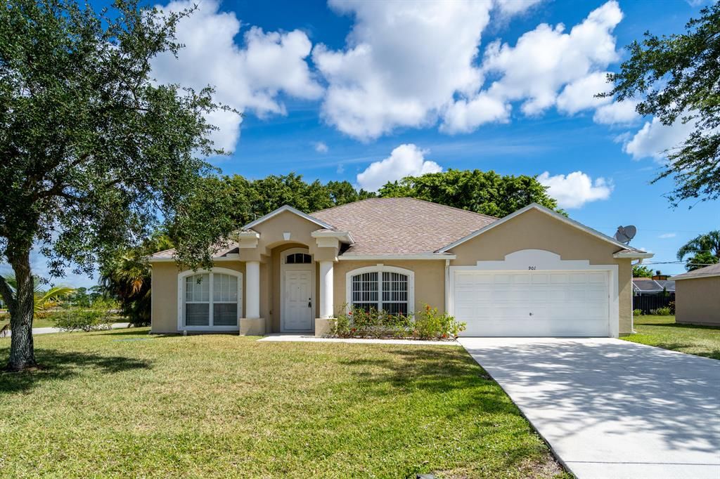 Photo of 901 SE Atlantus Avenue, Port Saint Lucie, FL 34983 (MLS # R10716932)