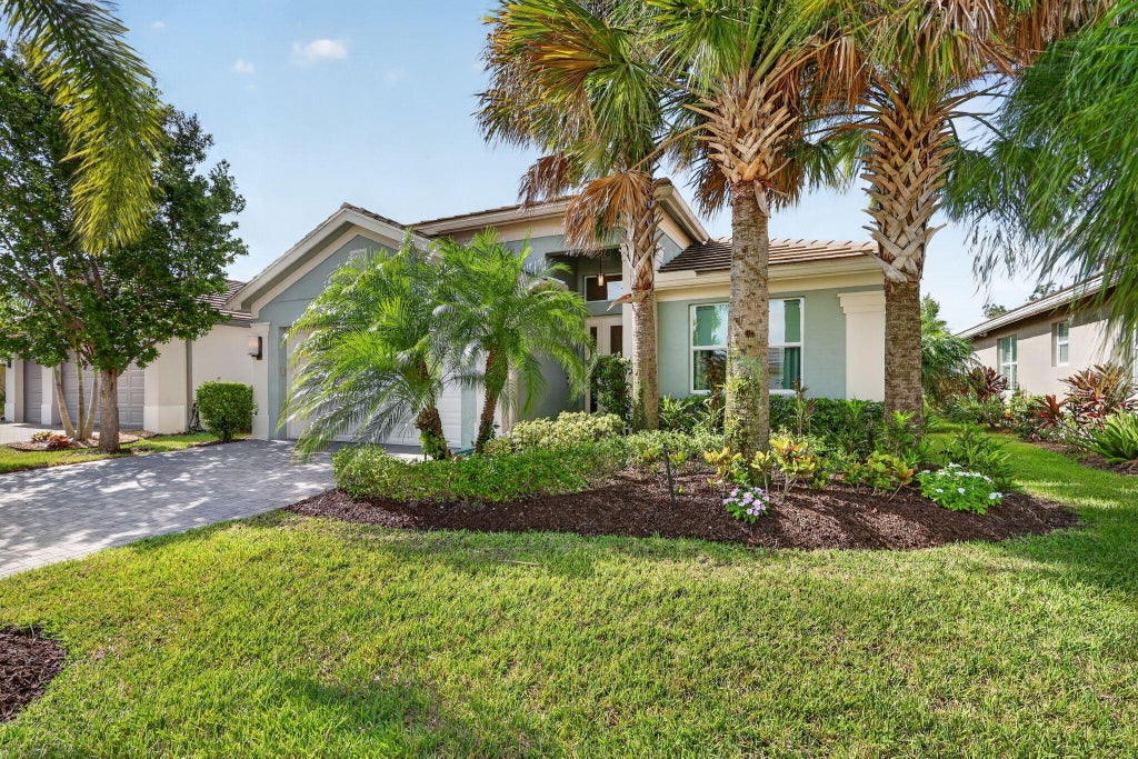 Photo of 11553 SW Half Moon Lake Lane, Port Saint Lucie, FL 34987 (MLS # B26058272)