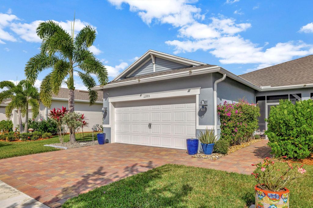 Photo of 12995 SW Gingerline Drive, Port Saint Lucie, FL 34987 (MLS # R10935054)