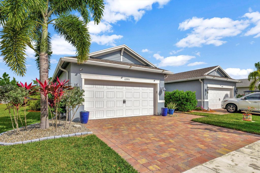 Photo of 12995 SW Gingerline Drive, Port Saint Lucie, FL 34987 (MLS # R10935054)