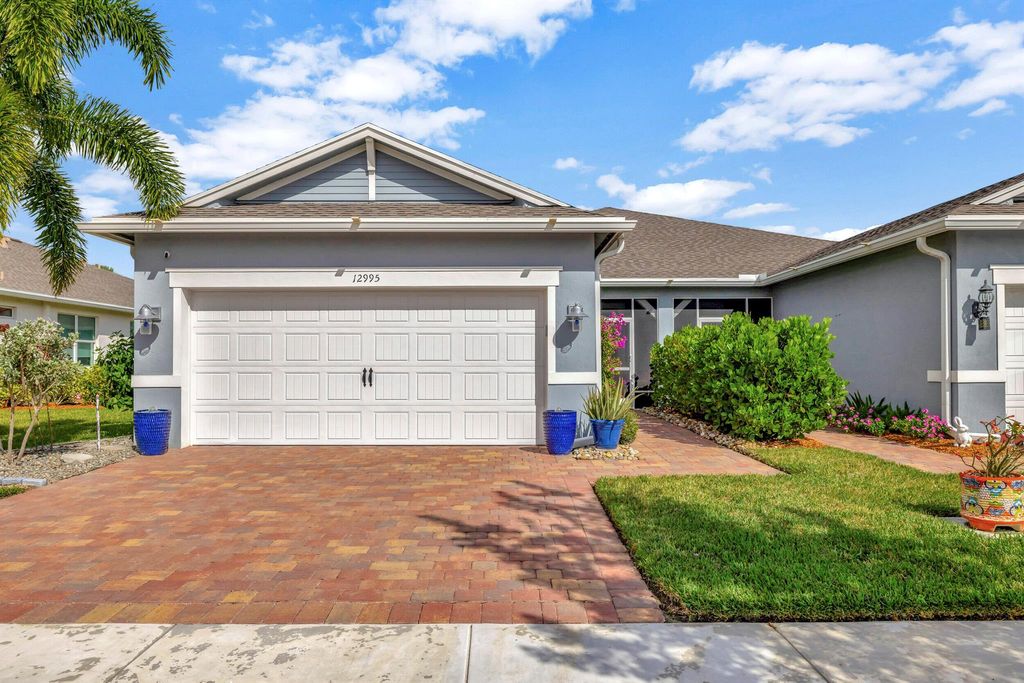 Photo of 12995 SW Gingerline Drive, Port Saint Lucie, FL 34987 (MLS # R10935054)