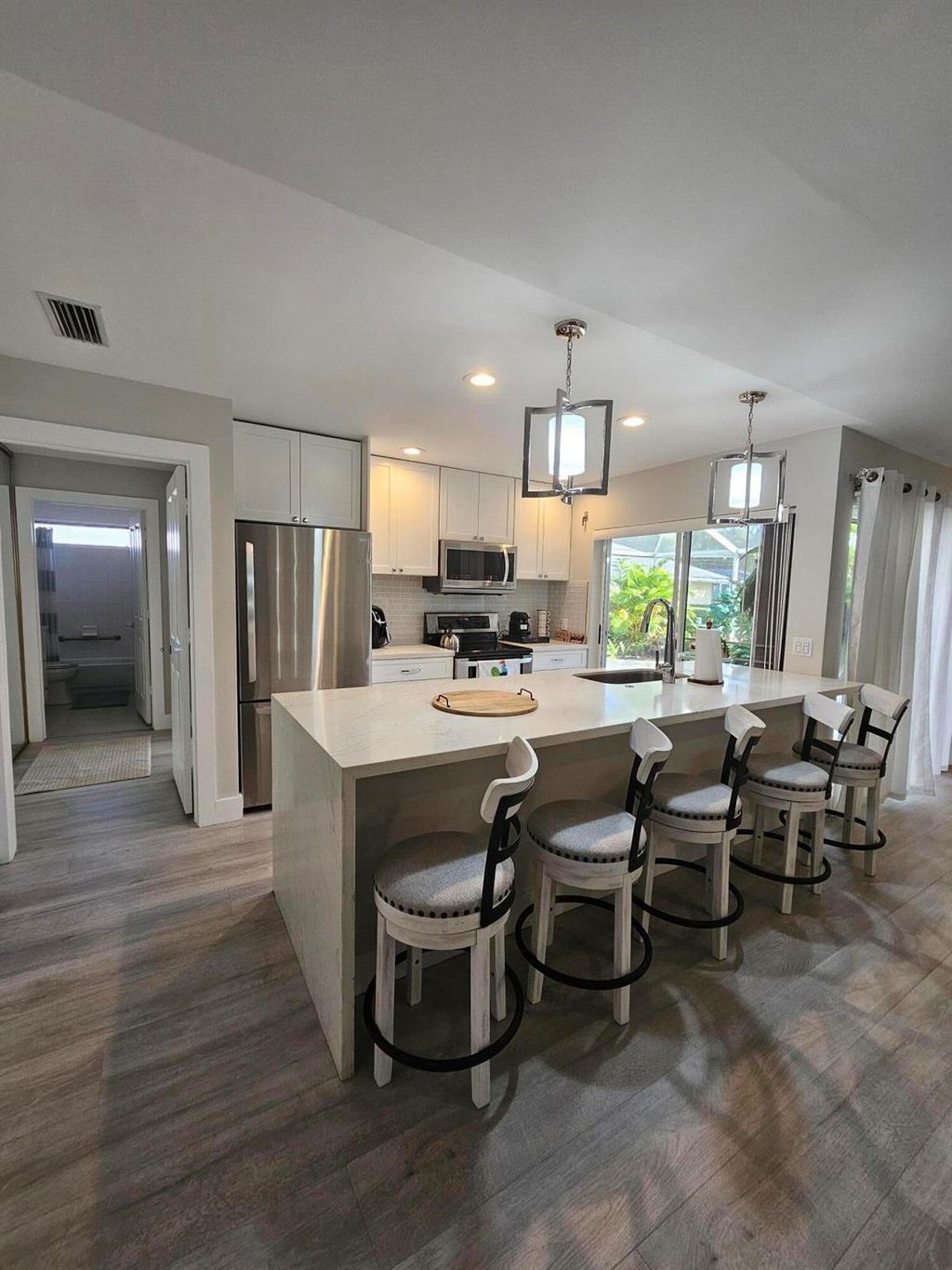 Photo of 3803 Ridgewood Drive, Palm Beach Gardens, FL 33403 (MLS # R10965116)