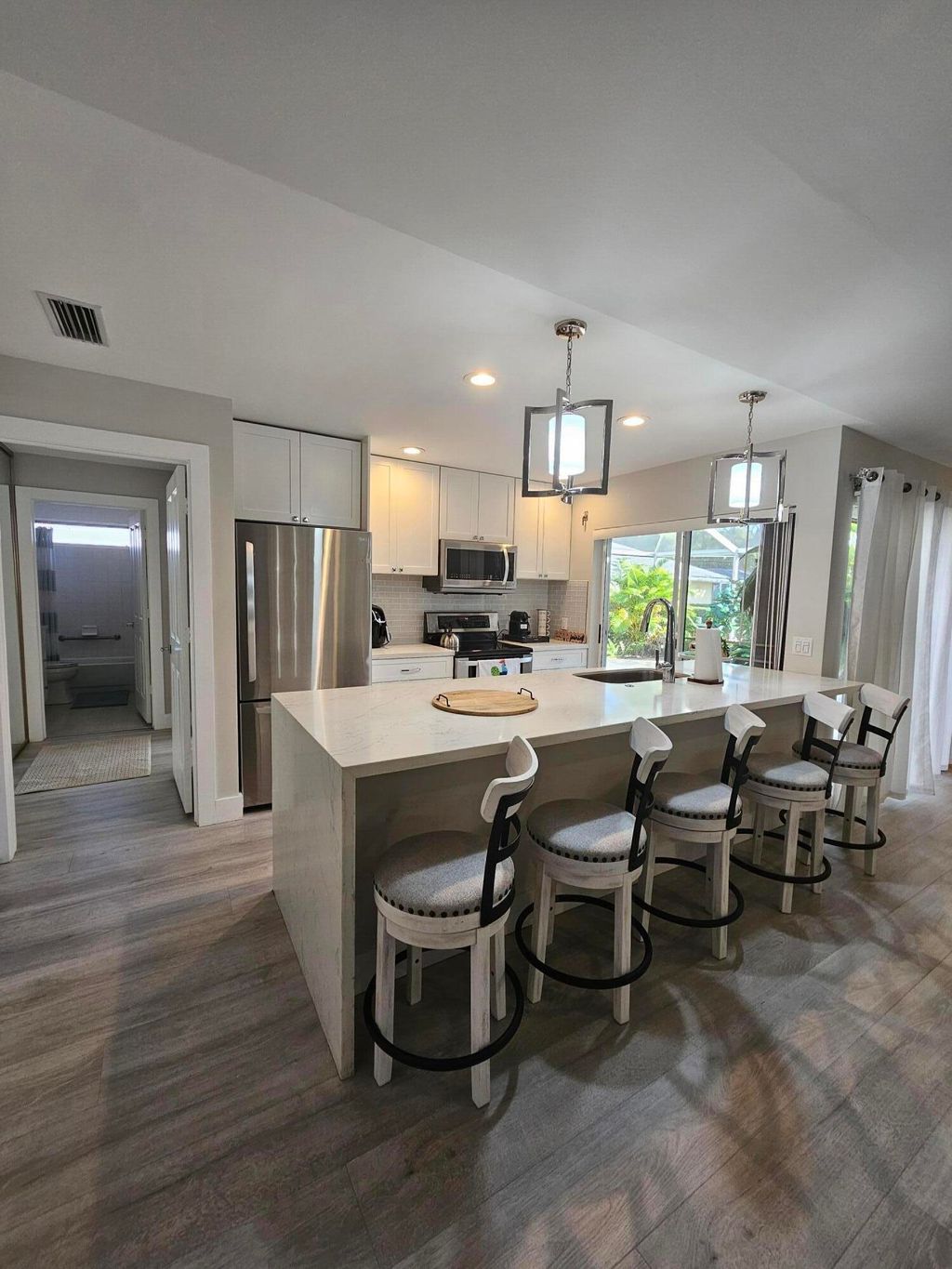 Photo of 3803 Ridgewood Drive, Palm Beach Gardens, FL 33403 (MLS # R10965116)