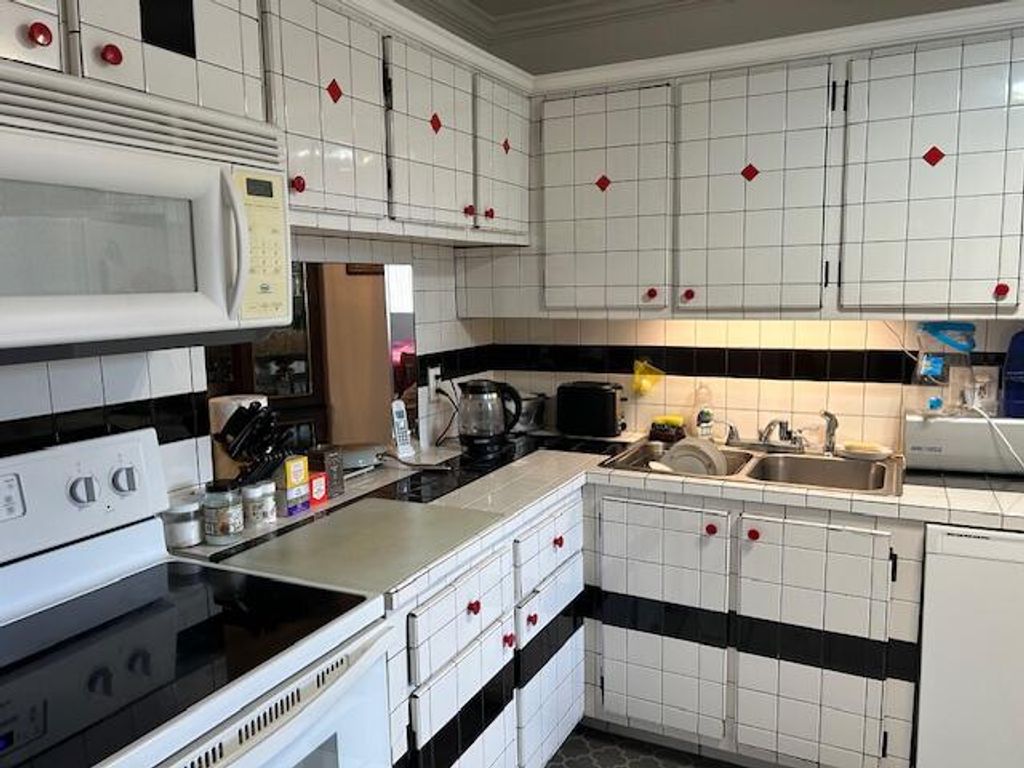 Photo of 225 Lake Meryl Drive, West Palm Beach, FL 33411 (MLS # R11158489)