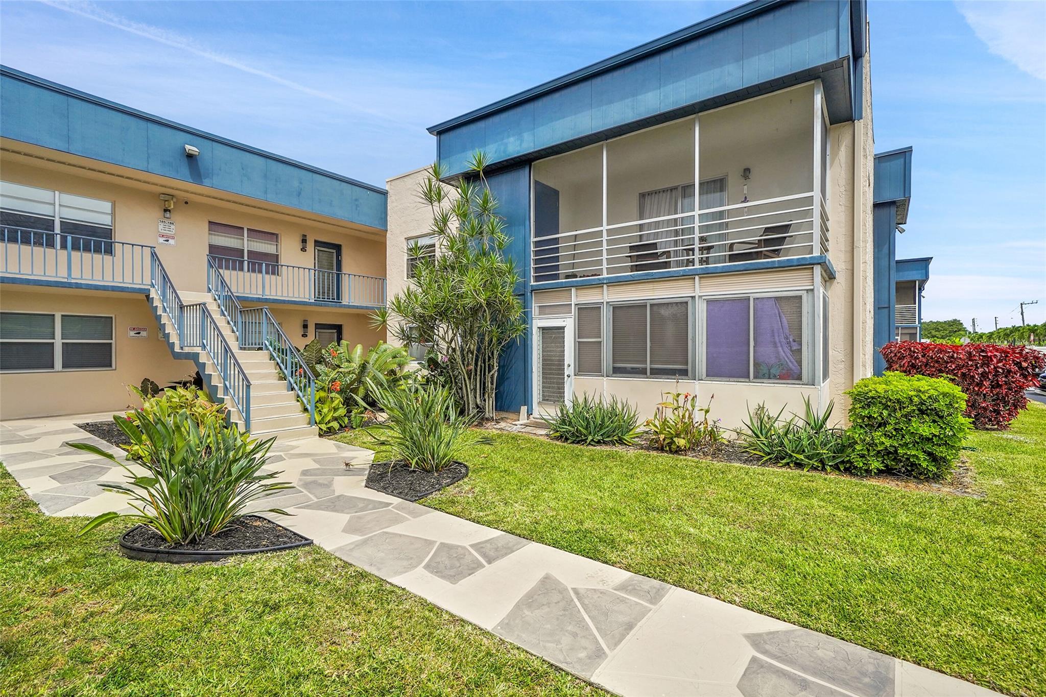 Welcome to the finest residence in Kings Point—this stunning first-floor 2/2 unit, located within the prestigious Flanders D section of Kings Point, a vibrant 55+ community. This meticulously updated unit features a fully remodeled kitchen with elegant granite countertops and new appliances. Offered fully turnkey with stylish furniture and professional decoration, this unit is ready for immediate move-in. Additional highlights include a new washer, impact windows throughout, and a private patio. Water, cable, security, and exterior insurance included in HOA fee. Premium amenities, including tennis, golf, pickleball, billiards, indoor and outdoor pools, a café, and a courtesy bus service for convenient access to nearby shopping. Assigned parking, along with ample guest spaces available.