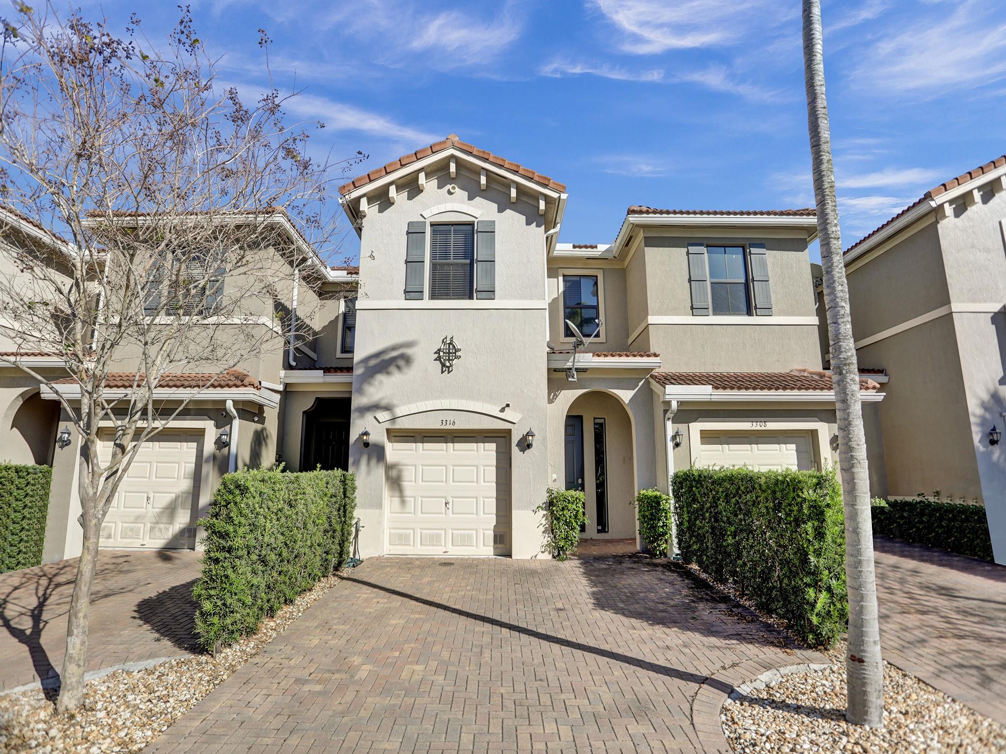 Amazing Opportunity in Prime Pompano Beach Location! This newer construction 2016 townhome is situated in a gated lakeside community. Meticulously maintained, this vibrant residence features 3 bedrooms, 2.5 baths, and 1-car garage. Enjoy upgraded appliances, including a convenient second-floor washer/dryer. The spacious floor plan features 9'6 ceilings, granite countertops, tile floors, new carpet, full impact windows and doors, a sizable primary closet, and a 2-car paver driveway along with a 1-car garage. Located close to the resort-style pool, tot lot, and additional parking area for your guests. Low HOA of just $153/monthly, centrally located, offering proximity to shopping, quick access to major highways, and is conveniently located across from the Tri-Rail. Easy to show!
