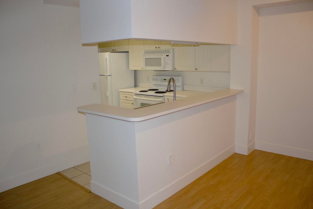 Photo of 3022 Alcazar Place #104, Palm Beach Gardens, FL 33410 (MLS # R11010762)