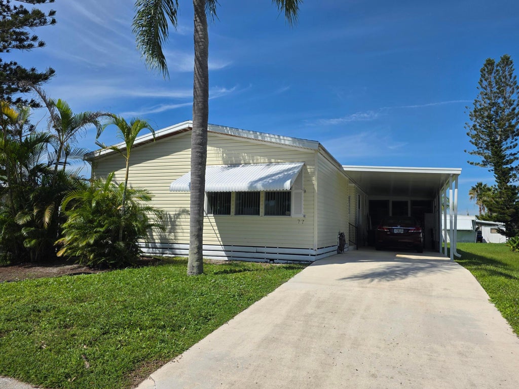 Photo of 77 Mediterranean Boulevard E, Port Saint Lucie, FL 34952 (MLS # B26083192)