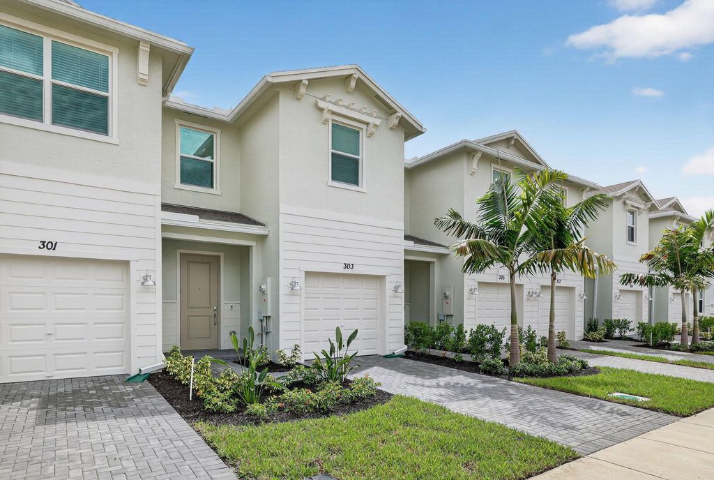 Photo of 303 SE Crossoak Lane, Port Saint Lucie, FL 34984 (MLS # R11123583)