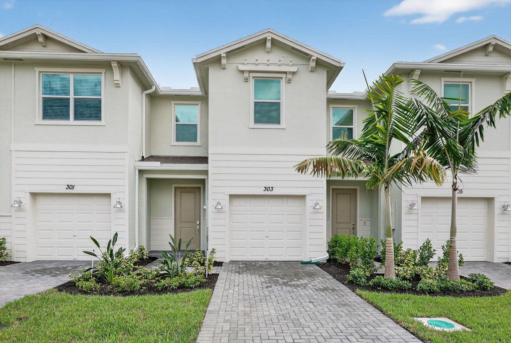 Photo of 303 SE Crossoak Lane, Port Saint Lucie, FL 34984 (MLS # R11123583)