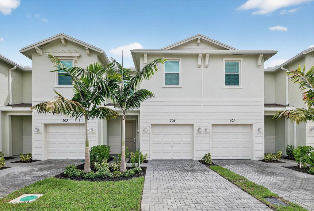 Photo of 303 SE Crossoak Lane, Port Saint Lucie, FL 34984 (MLS # R11123583)