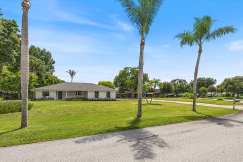 Photo of 621 NE Town Terrace, Jensen Beach, FL 34957 (MLS # B26050149)