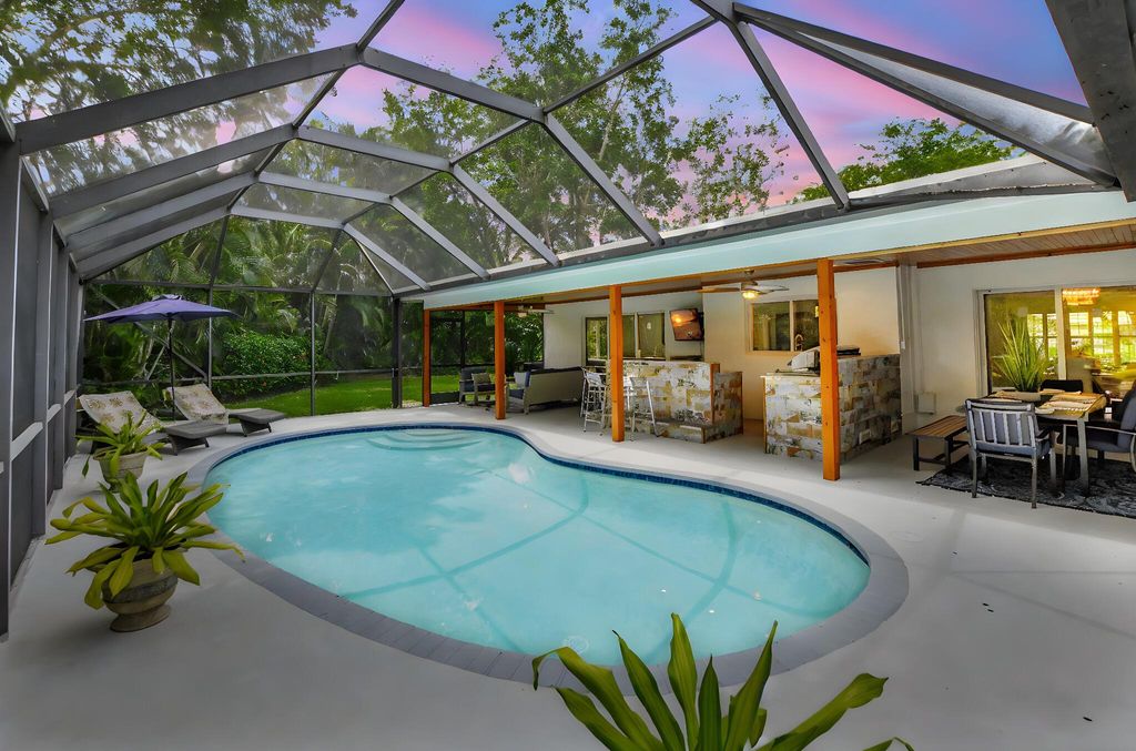 Photo of 2416 NW 32nd Street, Boca Raton, FL 33431 (MLS # R11079376)