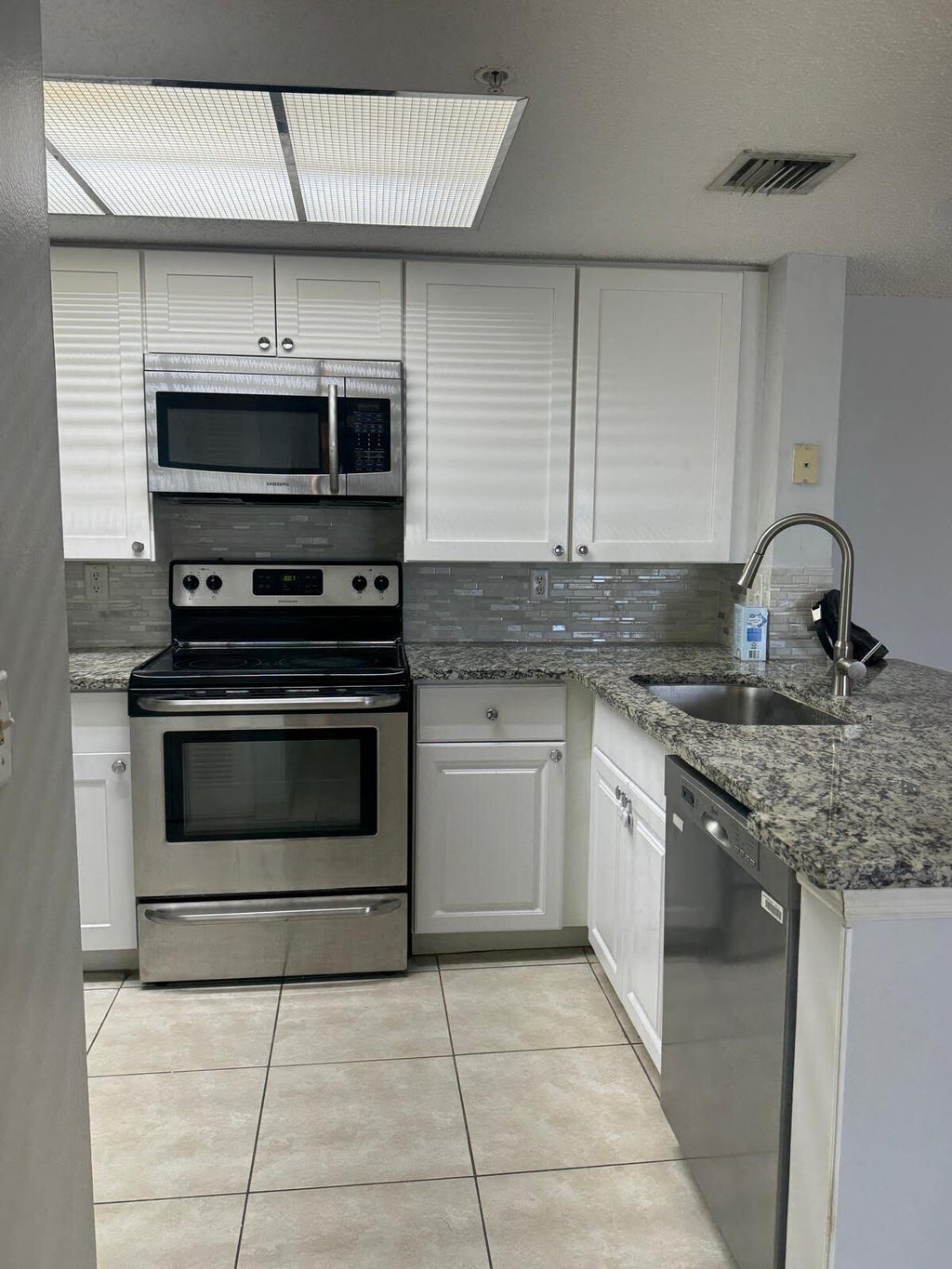 Photo of 5045 WILES Road #308, Coconut Creek, FL 33073 (MLS # B26078963)
