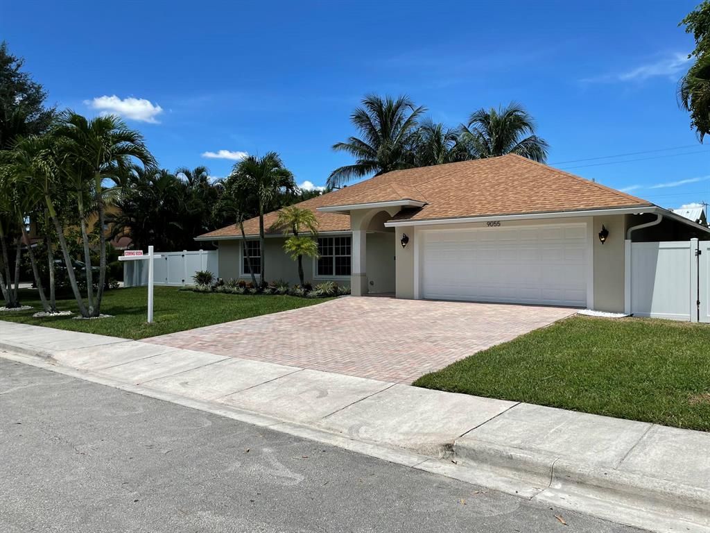 Photo of 9055 Brandy Lane Ln, Lake Worth Beach, FL 33467 (MLS # R10740446)