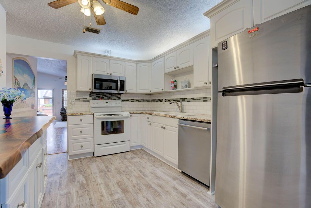 Photo of 8171 SE Villa Way, Hobe Sound, FL 33455 (MLS # R10976173)