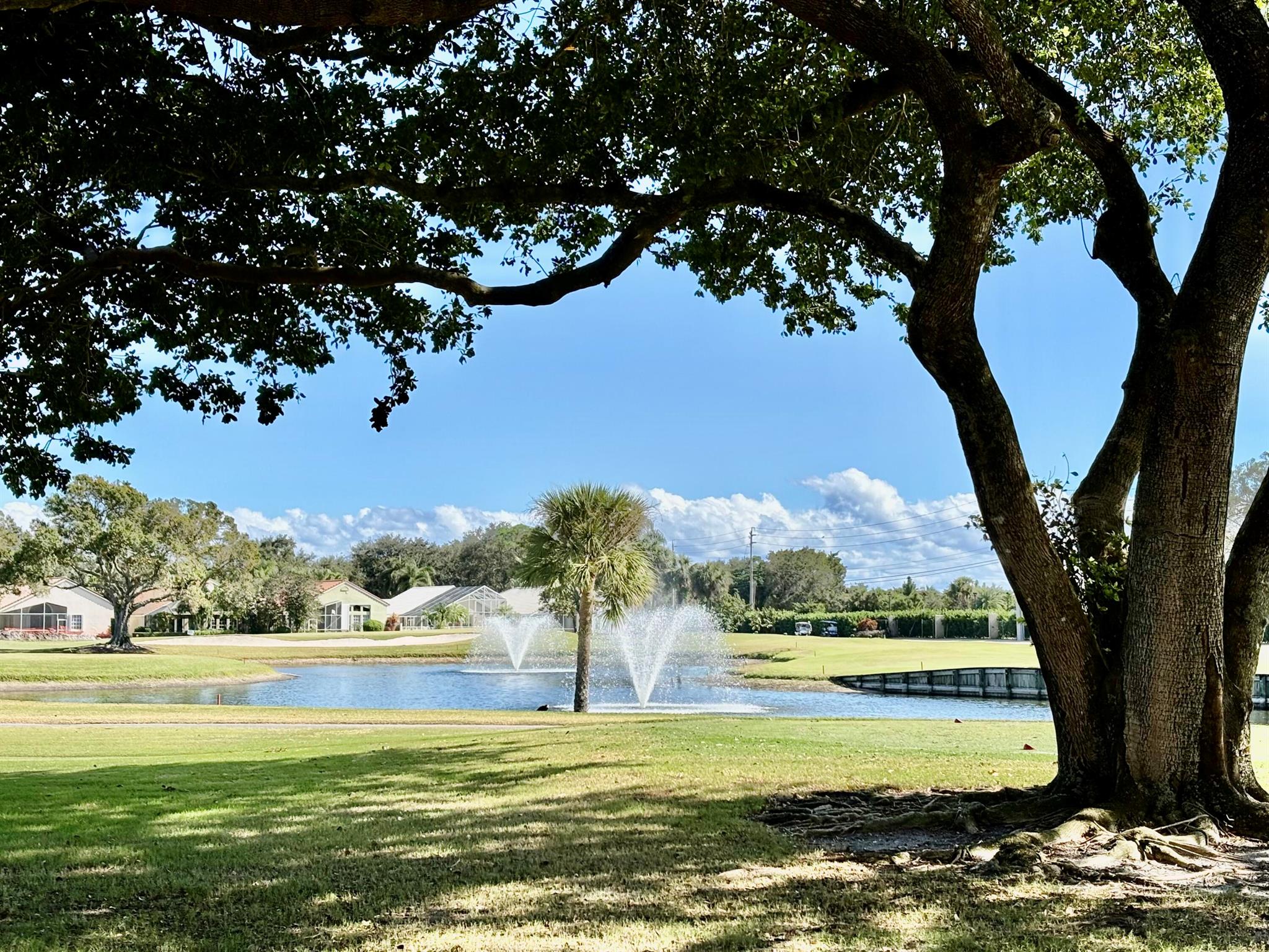 **$10,000 Memership Credit at Closing****Welcome to this immaculate 2 Bedroom, 2 Bath condo located in the heart of a vibrant country club community. This beautifully maintained unit comes with updated impact windows, new A/C and brand new Washer and Dryer. Step into this spacious living area with lots of natural light. The open floor plan seamlessly connects the living and dining room creating an ideal setting for entertainment or enjoying quiet moments at home. This unit is impeccably clean, offering a move in ready experience. As part of the country club, you'll enjoy access to premium amenities such as golf, tennis, swimming, dining and social activities. Don't miss this opportunity to own a piece of paradise