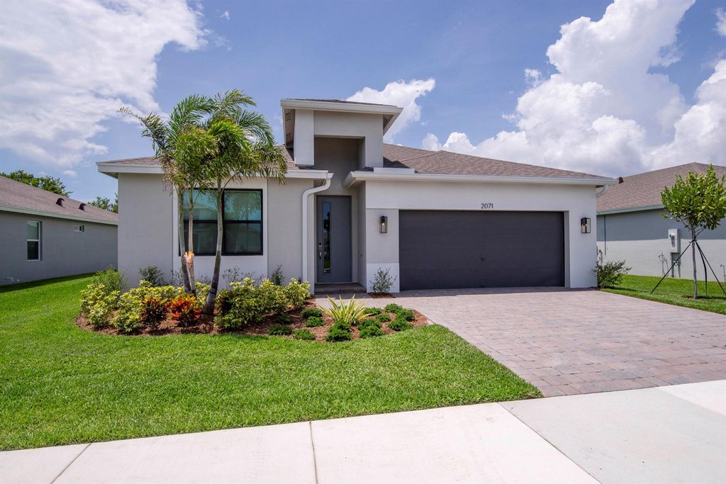 Photo of 2071 NE Cedar Street, Jensen Beach, FL 34957 (MLS # R11146061)