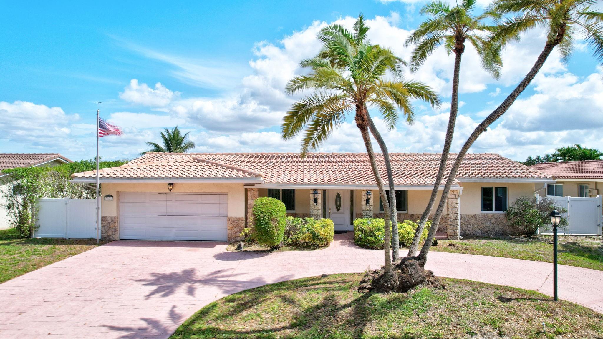 Your Private lakefront retreat awaits, in prestigious Royal Palm South, NO HOA! This immaculate 4-bedroom, 2-bath pool home offers tranquil water views and a screened patio for effortless entertaining. The home features hurricane-impact windows and an oversized primary suite with a walk-in closet. Includes a Home warranty for added peace of mind. Elegant touches include crown molding, formal living and dining rooms, and a cozy family room with a breakfast nook. The open-concept kitchen flows beautifully into the main living spaces, ideal for everyday living. A rare concrete slab provides convenient boat or RV storage. Located just minutes from top-rated schools, I-595, and premier shopping. A true gem that blends luxury with inviting charm, don’t miss this exceptional opportunity!
