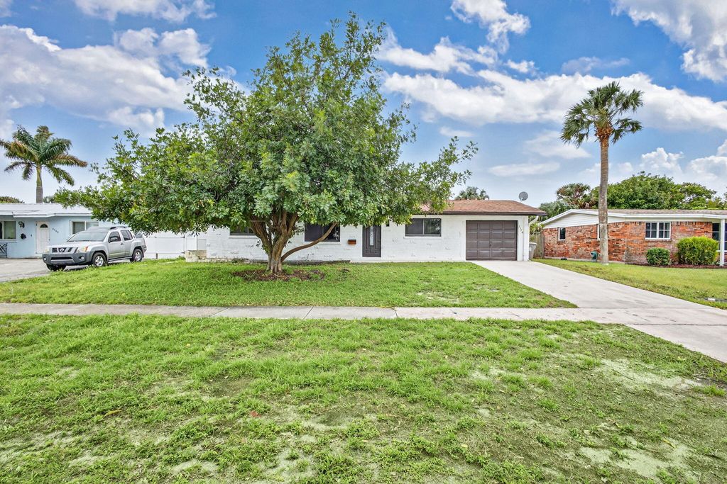 Photo of 3374 Florida Boulevard, Palm Beach Gardens, FL 33410 (MLS # B26003701)