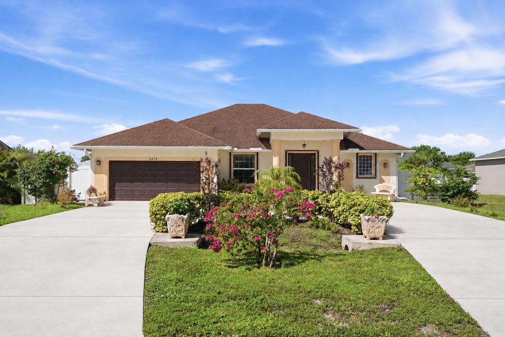 Photo of 2272 SW Cameo Boulevard, Port Saint Lucie, FL 34953 (MLS # B26075850)