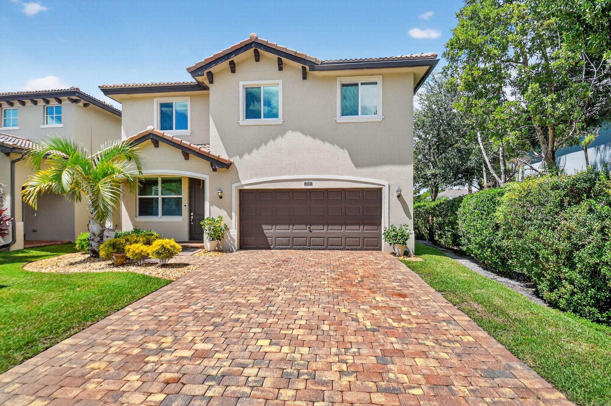 Beautifully maintained 5 bedroom, 3 bath home with 2,855 living square footage in the desirable Abbington gated community in Lake Worth! Built in 2016, this bright two-story home with two-car garage, boasts the privacy of being one of the northernmost home in the community, on a quiet end street!Enter through the grand living room and dining room space, offering high ceilings and neutral tiled flooring. Ceiling heights and flooring continue in to the spacious family room aside the open gourmet kitchen offering granite countertops, a tiled backsplash, stunning espresso wood cabinetry, large chefs island with sink, stainless steel appliances and a substantially sized breakfast area. Another exceptional property highlight is the well-thought out downstairs guest bedroom with ...