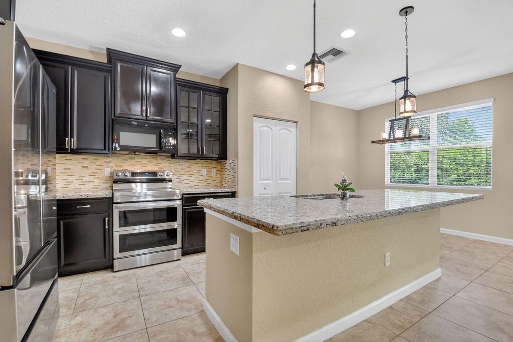Photo of 6789 Langdon Way, Lake Worth, FL 33463 (MLS # R11123458)