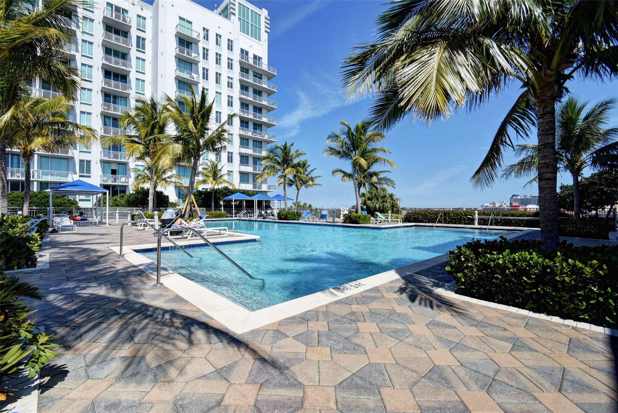 Luxury living in this contemporary building, east of Interstate 95 in Downtown West Palm Beach. This 2/2 unit has high ceilings for a loft-like ambiance, 24-hour attended lobby, stunning tropical pool, clubhouse, fitness center, BBQ grill and jacuzzi. Walking distance to the Tri-Rail with direct access to Miami and the new high-speed Brightline Train connecting West Palm Beach to Miami and Orlando. Walk to the Kravis Center for the Performing Arts, City Place, Clematis Street and all the restaurants, bars, and nightlife of West Palm Beach. Using the “Circuit” you can shuttle to Worth Avenue and any of the amenities available in Palm Beach including the renowned “Breakers”. 7 minutes to Palm Beach International Airport (PBI), pet-friendly, One covered assigned space .Trucks are not allowed.