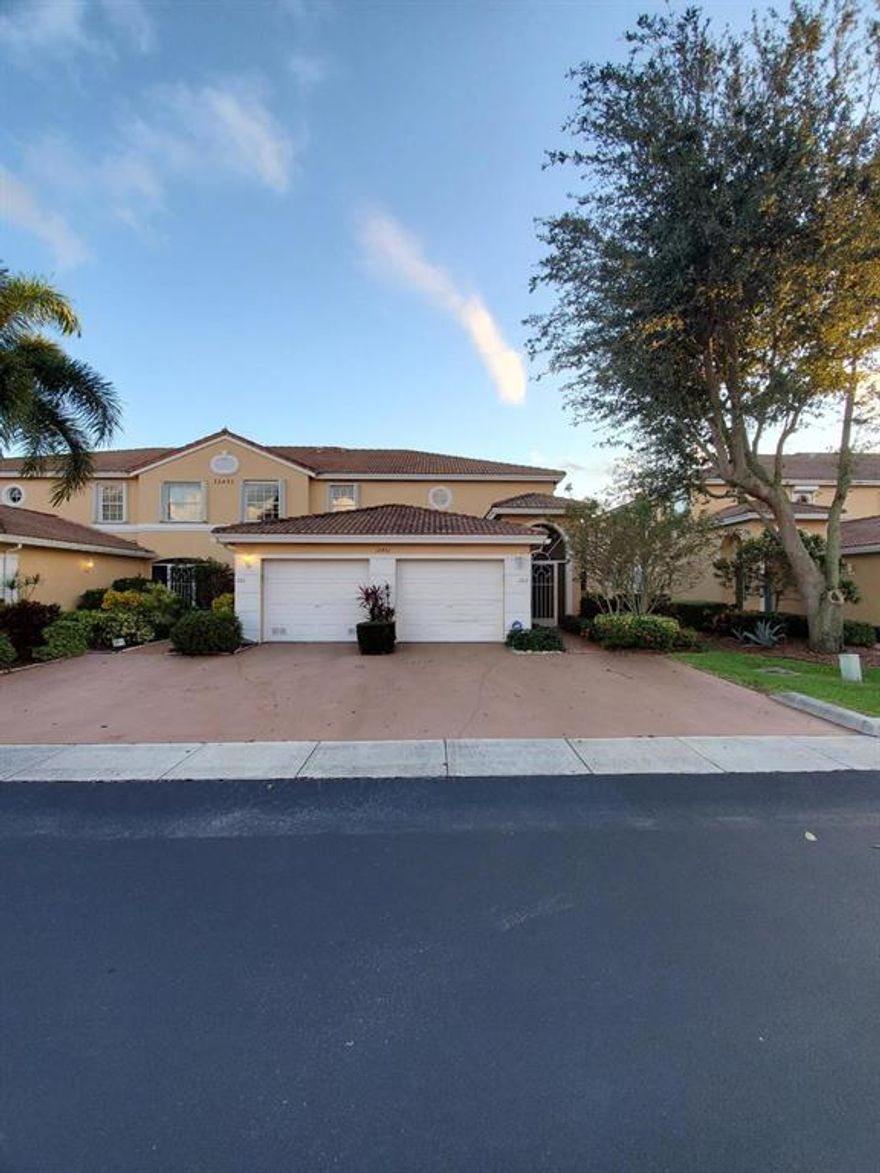 2nd Floor Coach Home with Private Elevator and Garage.  Turnkey and ready to move-in.  Impact Windows on the Patio sliders and Accordian Shutters on the windows.  Master Bathroom was recently redone and is gorgeous.  Newer AC 2016.