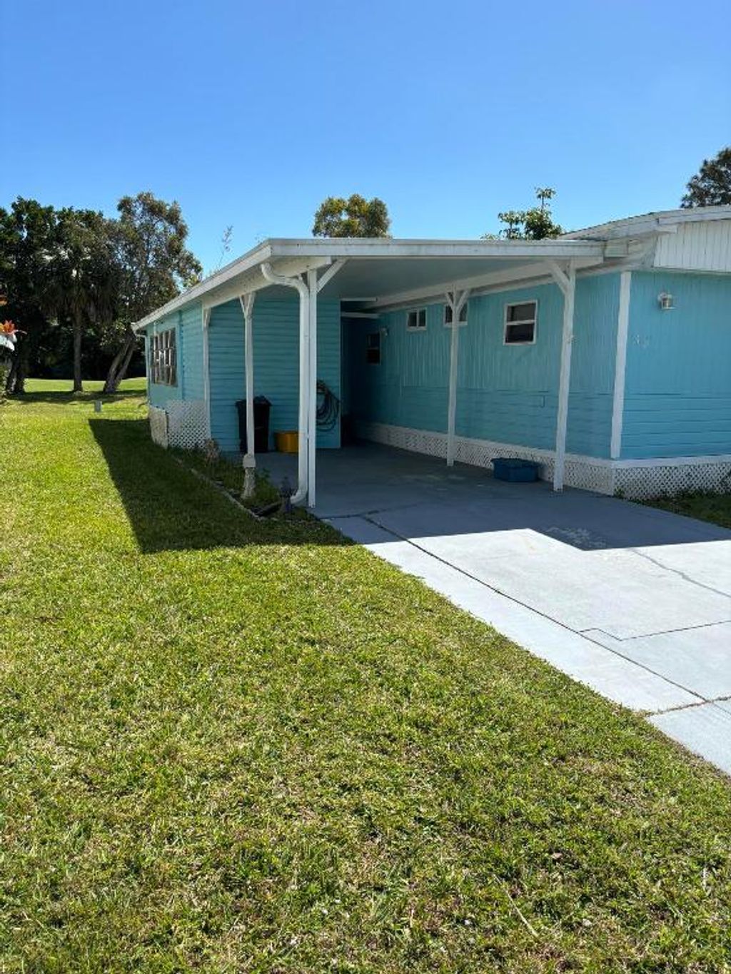 Photo of 38 Golf Dr, Port Saint Lucie, FL 34952 (MLS # R10972359)