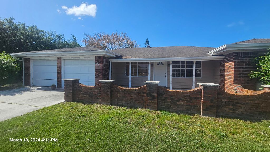 Photo of 301 NW Prima Vista Boulevard, Port Saint Lucie, FL 34983 (MLS # R10970362)