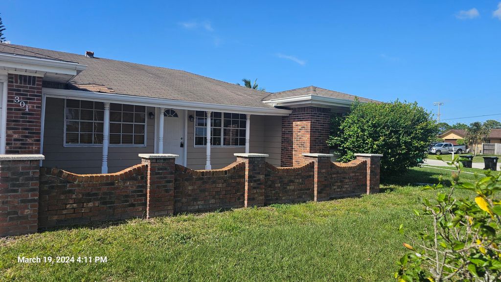 Photo of 301 NW Prima Vista Boulevard, Port Saint Lucie, FL 34983 (MLS # R10970362)