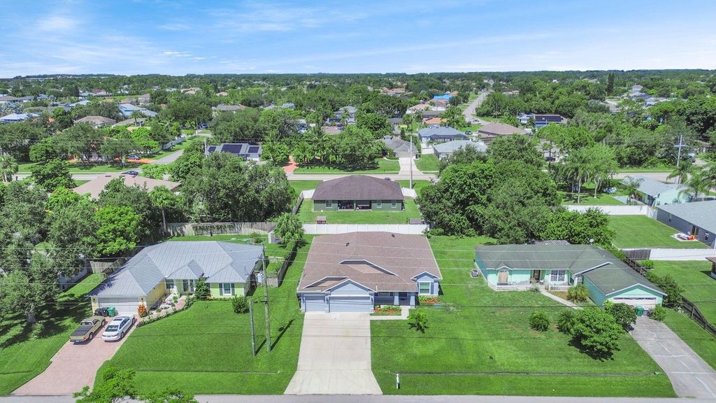 Photo of 2314 SW Woodridge Street, Port Saint Lucie, FL 34953 (MLS # R11109145)