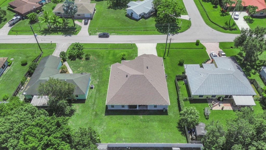 Photo of 2314 SW Woodridge Street, Port Saint Lucie, FL 34953 (MLS # R11109145)